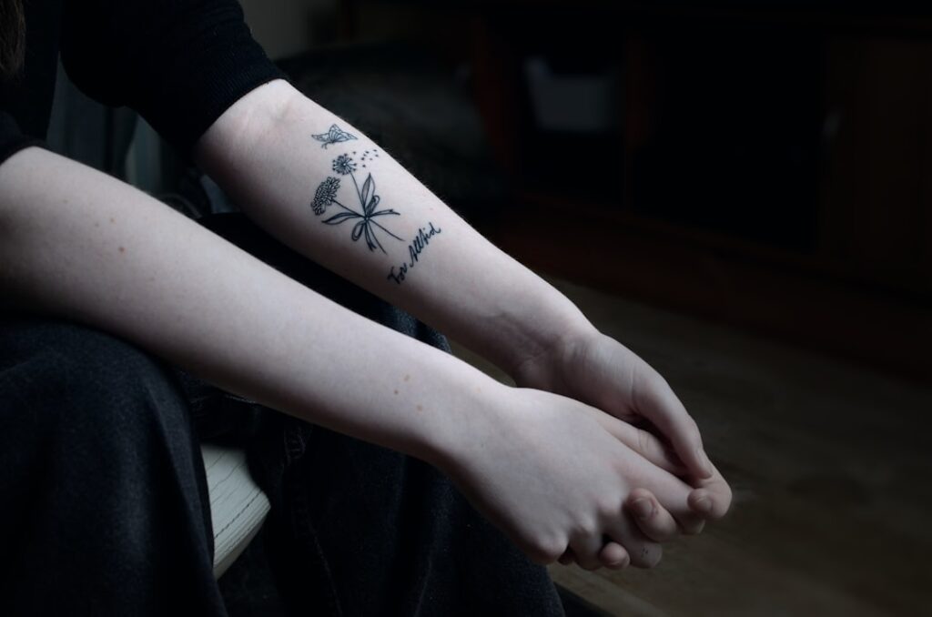 Een vader zoon tattoo als teken van verbondenheid